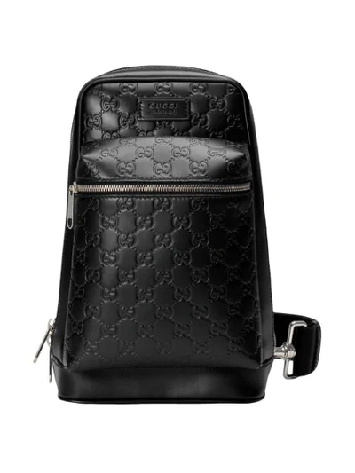 Gucci Men's Gg Leather Crossbody Backpack In 1000