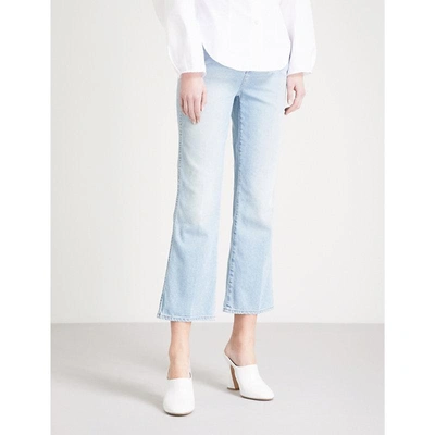 Khaite Benny Cropped Flared Mid-rise Jeans In Austin