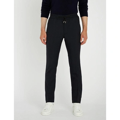 Sandro Regular-fit Tapered Woven Trousers In Marine