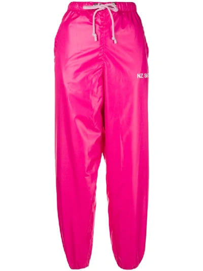 Natasha Zinko Textured Logo Jogging Trousers In Pink/purple