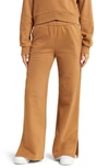 Beyond Yoga On The Go Wide Leg Flare Pants In Toffee