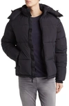 The Very Warm Gender Inclusive Hooded Puffer Coat In Black