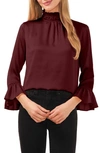 Cece Flare Cuff Smocked Mock Neck Top In Deep Red