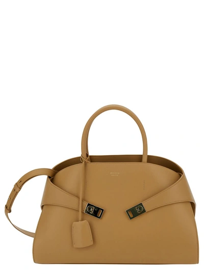 Ferragamo 'hug M' Beige Handbag With Logo And Gancini Buckle In Leather Woman