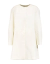 Vionnet Overcoats In White