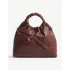 The Row Circle Leather Cross-body Bag In Light Burgendy