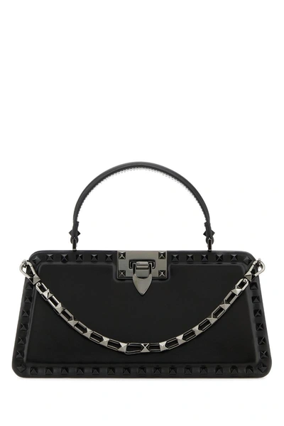Valentino Garavani Handbags. In Black