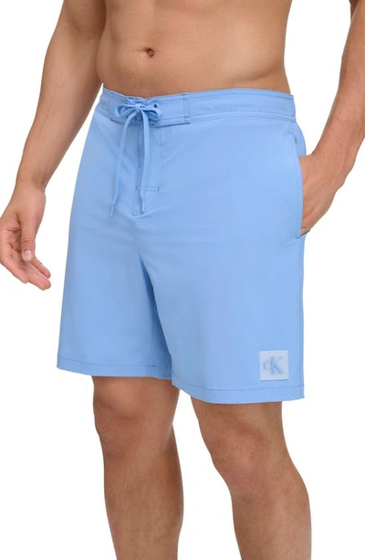 Calvin Klein Solid Stretch Board Shorts In Light Blue