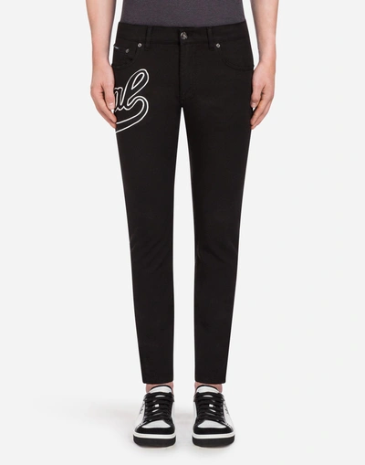Dolce & Gabbana Five Pocket Trousers In Stretch Cotton With Patch In Black