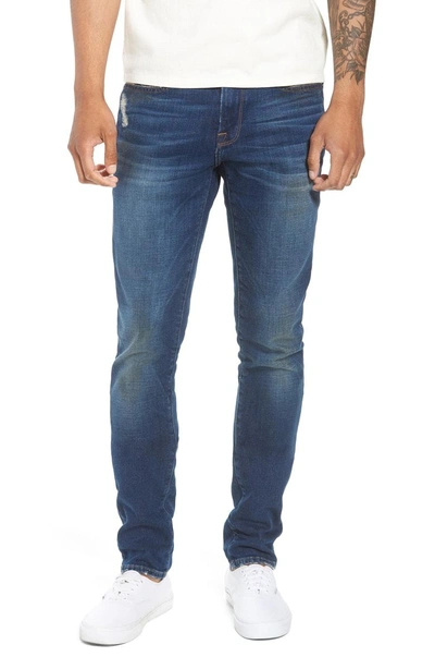 Frame L'homme Skinny-fit Distressed Stretch-denim Jeans In Mid Denim