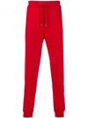 Versace Tapered Joggers In Red