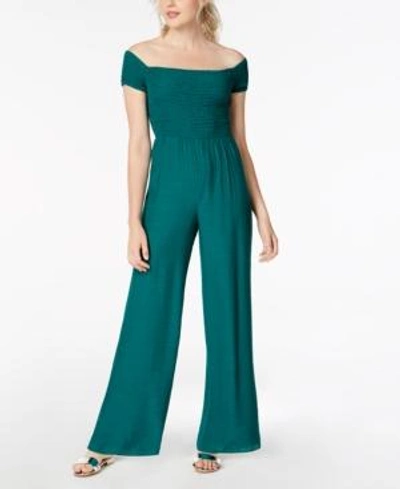 Guess Lily Smocked Off-the-shoulder Jumpsuit In Green Berry