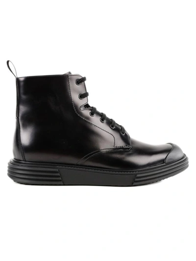 Prada Lug Sole Ankle Boots In Fnero