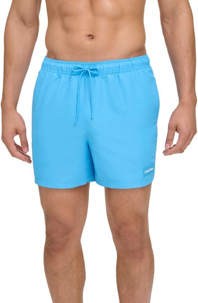 Calvin Klein Men's Core Euro Regular-fit Quick-dry 5" Swim Trunks With Compression Short Liner In Atlantis