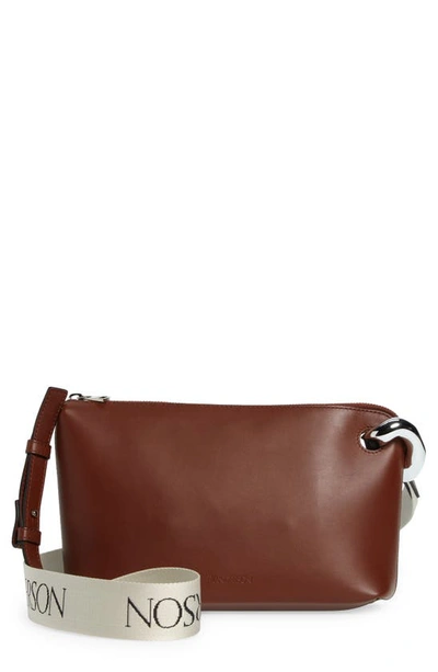 Jw Anderson The Corner Leather Crossbody Bag In Brown