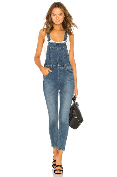 Free People Slim Ankle Denim Overall. In Indigo