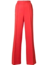 Prada Logo Patch Flared Trousers In Yellow