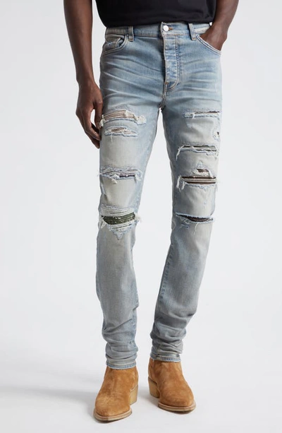 Amiri Thrasher Ripped Camo Patches Skinny Jeans In Antique Indigo