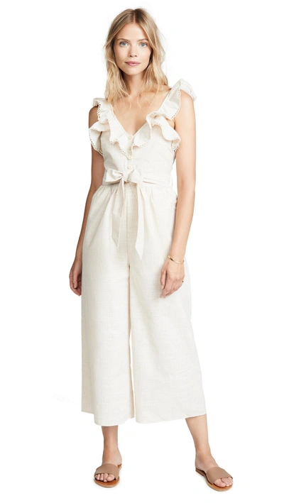 The Line Up Ruffle Jumpsuit In Cream Beige