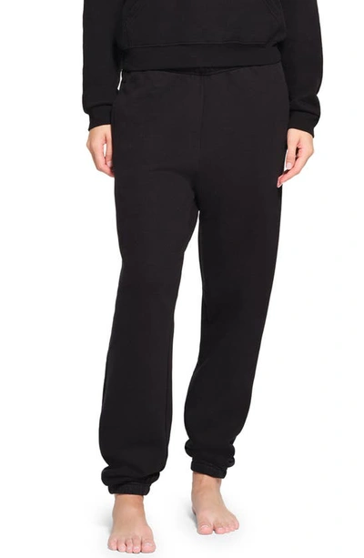 Skims Revised Classic Cotton Blend Fleece Sweatpants In Onyx