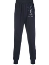 Moschino Double Question Mark Logo Track Pants In Blue