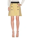 Dolce & Gabbana Mini Skirts In Yellow