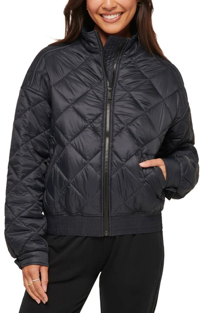 Travis Mathew Lights At Night Quilted Jacket In Obsidian