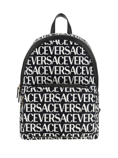 Versace Allover Logo Printed Zipped Backpack In Nero+bianco/oro