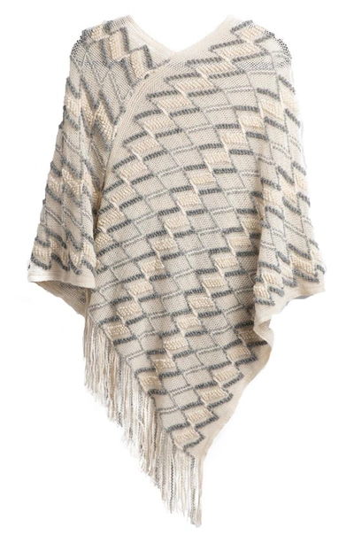 Saachi Chevron Tassel Poncho In Ivory