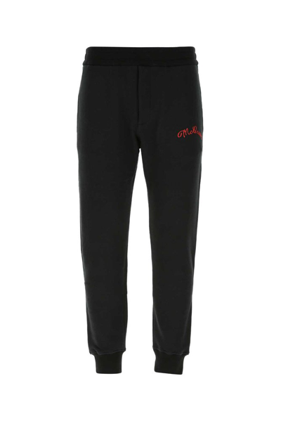 Alexander Mcqueen Embroidered Logo Track Trousers In Black