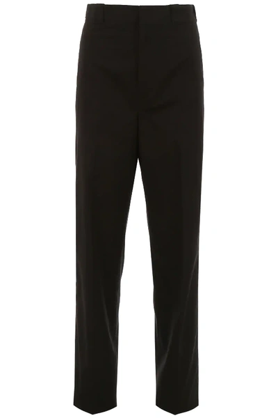 Prada Palazzo Trousers With Logo Patch In Black