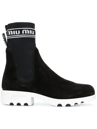 Miu Miu Boot Rubber Sole Logo In Black + White