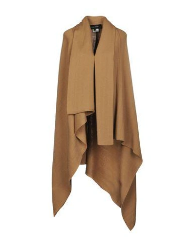 Each X Other Cape In Camel