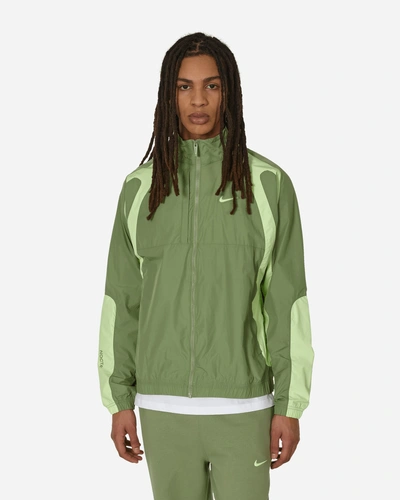 Nike Nocta Woven Track Jacket Oil In Oil Green/lt Liquid Lime/lt Liquid Lime