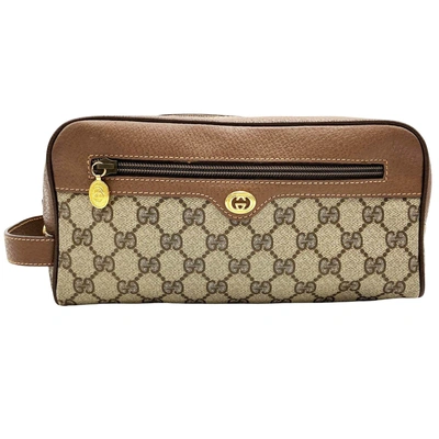 Gucci Brown Canvas Clutch Bag ()