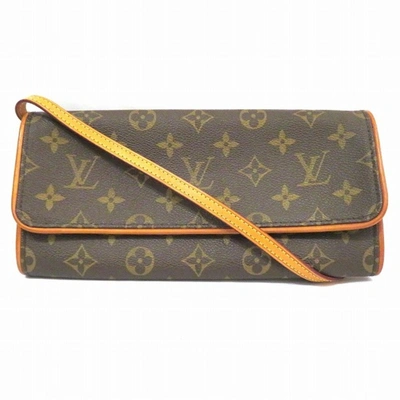 Pre-owned Louis Vuitton Twin Canvas Clutch Bag () In Brown