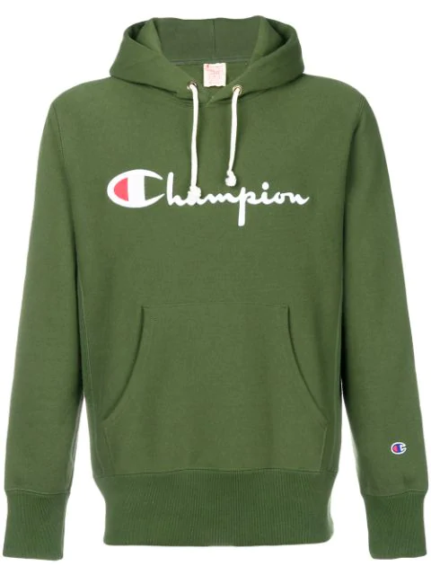 black champion hoodie with green logo
