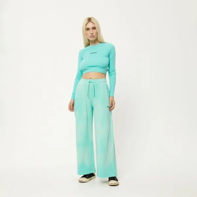 Afends Recycled Wide Leg Trackpants In Colour-blue