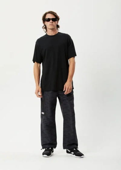 Afends Recycled Spray Pants In Black