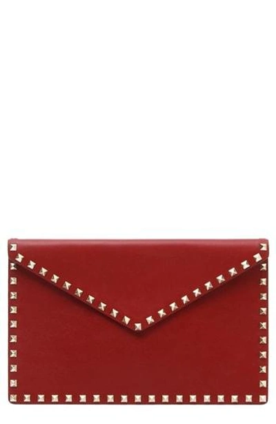 Valentino Garavani Large Rockstud Leather Envelope Clutch - Red In Rubino