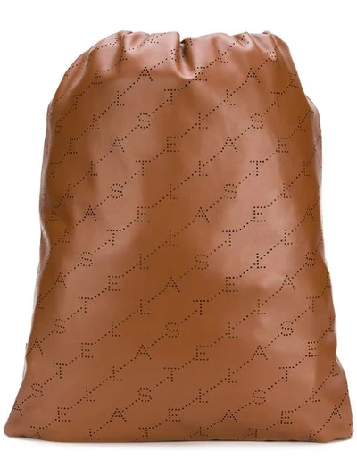 Stella Mccartney Logo Perforated Drawstring Backpack In Brown