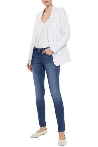 Dl1961 Faded Mid-rise Skinny Jeans In Mid Denim