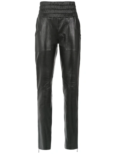 Clé Skinny Leather Trousers In Black
