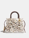 Coach Rogue 25 With Tea Rose In White In Chalk/brass