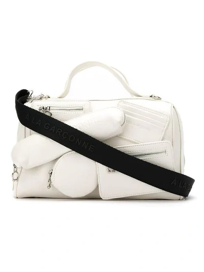 À La Garçonne Multi Pocket Shoulder Bag In White