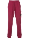Stone Island Logo Plaque Track Pants In Red