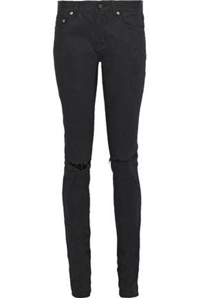 Saint Laurent Distressed Coated Mid-rise Skinny Jeans In Black