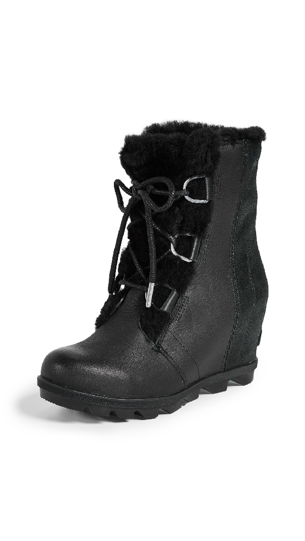 joan of arctic wedge genuine shearling bootie