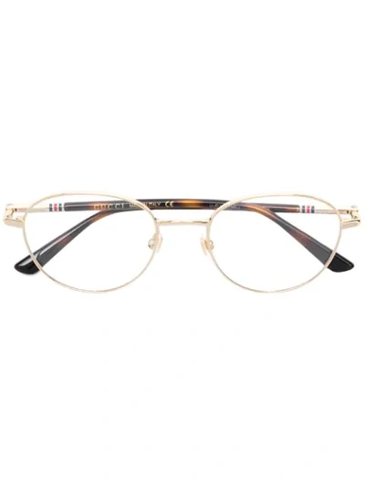 Gucci Oval Frame Glasses In Metallic