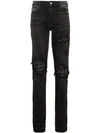 Amiri Distressed Jeans In Black